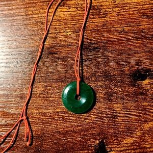 Jade necklace with red string